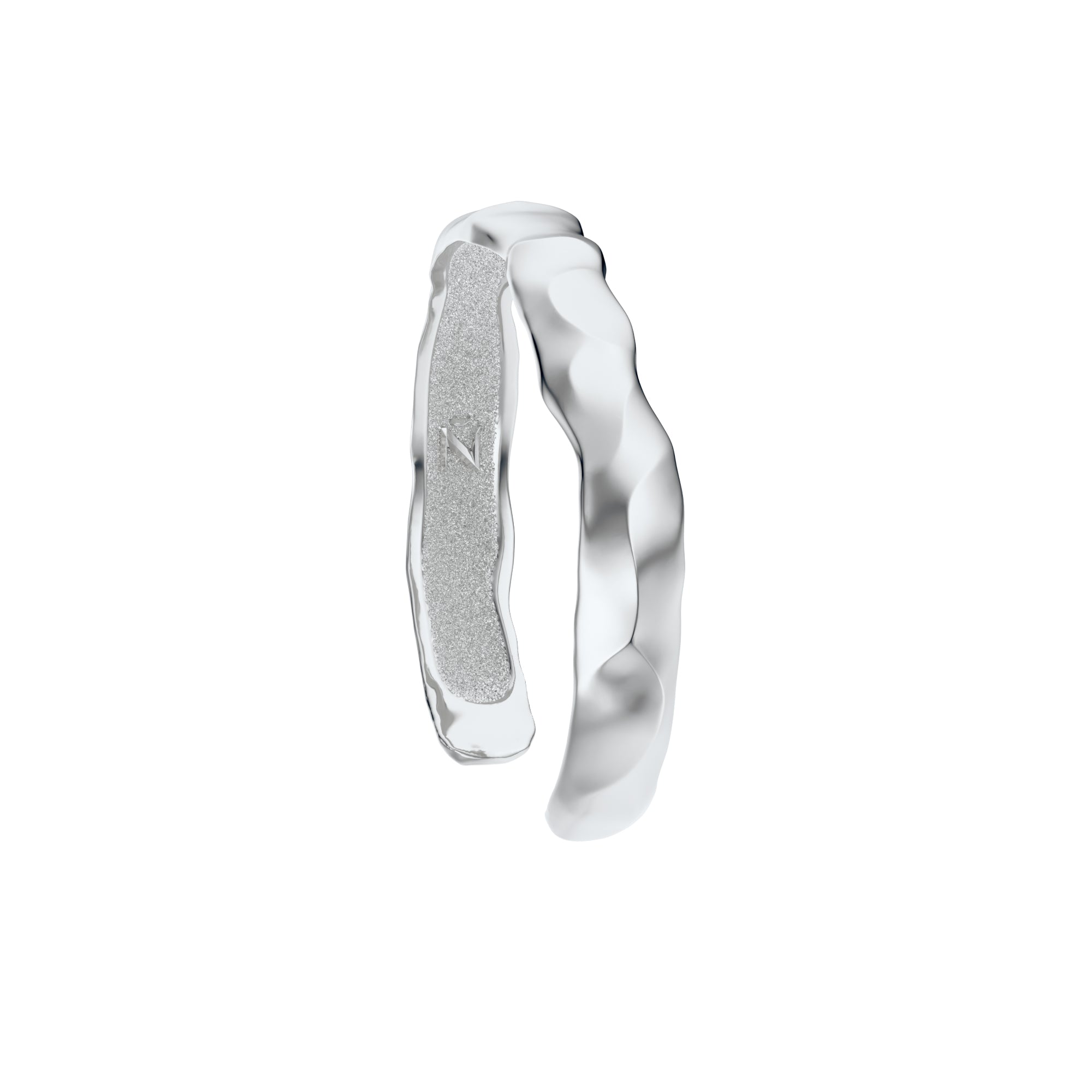 Silver Ourea cuff bracelet with a textured sculptural surface inspired by mountains and volcanic landscapes. 