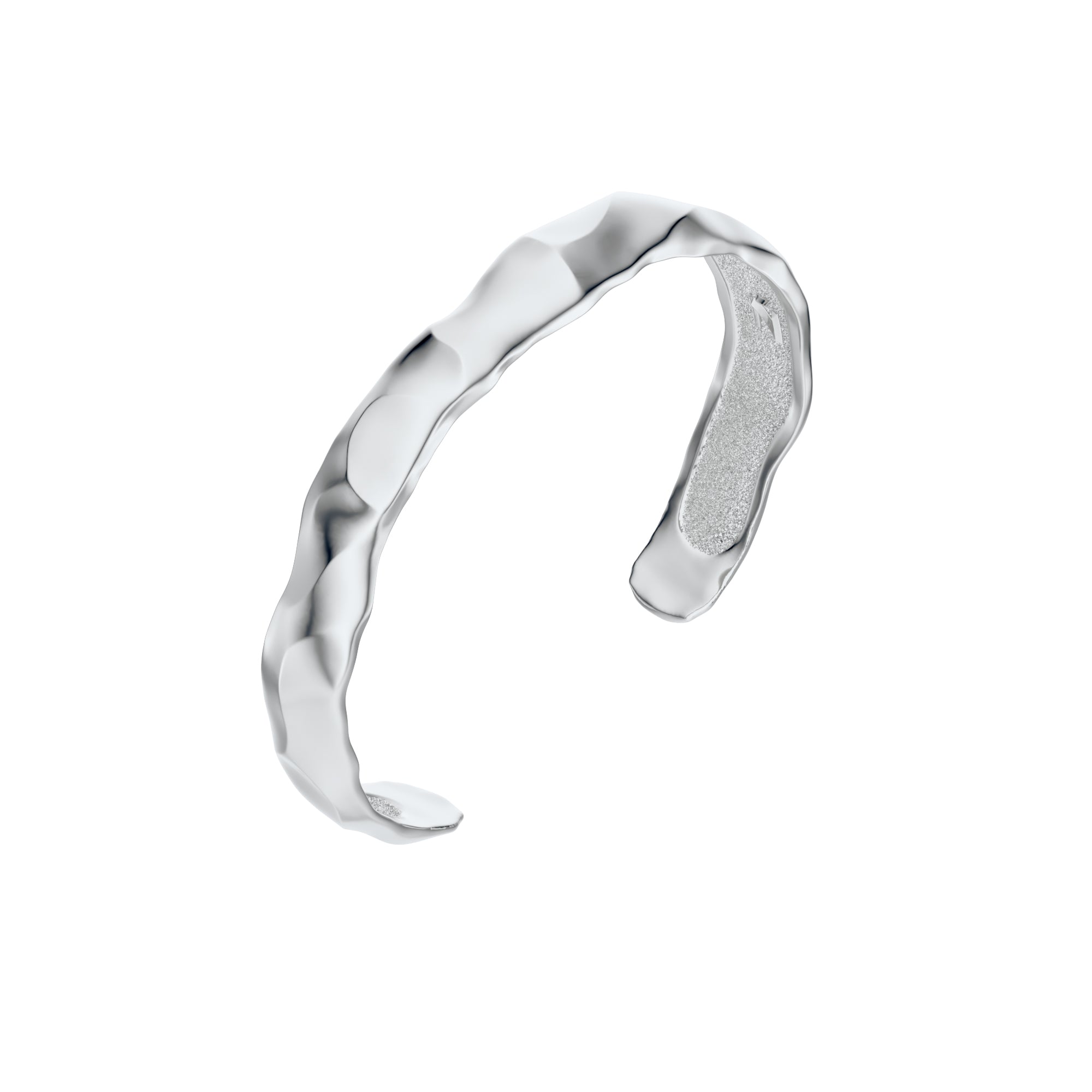 Silver Ourea cuff bracelet with a textured sculptural surface inspired by mountains and volcanic landscapes. 