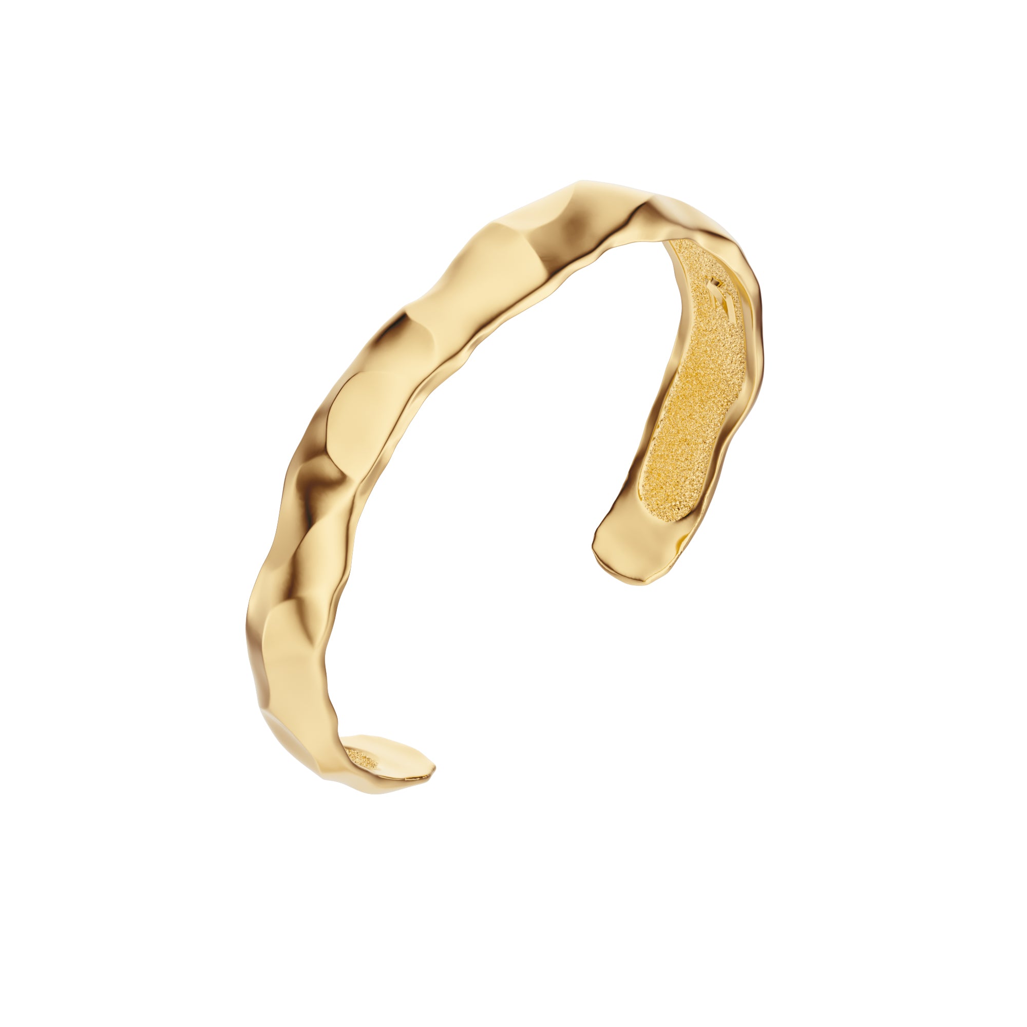 Gold Ourea cuff bracelet with a textured sculptural surface inspired by mountains and volcanic landscapes. 