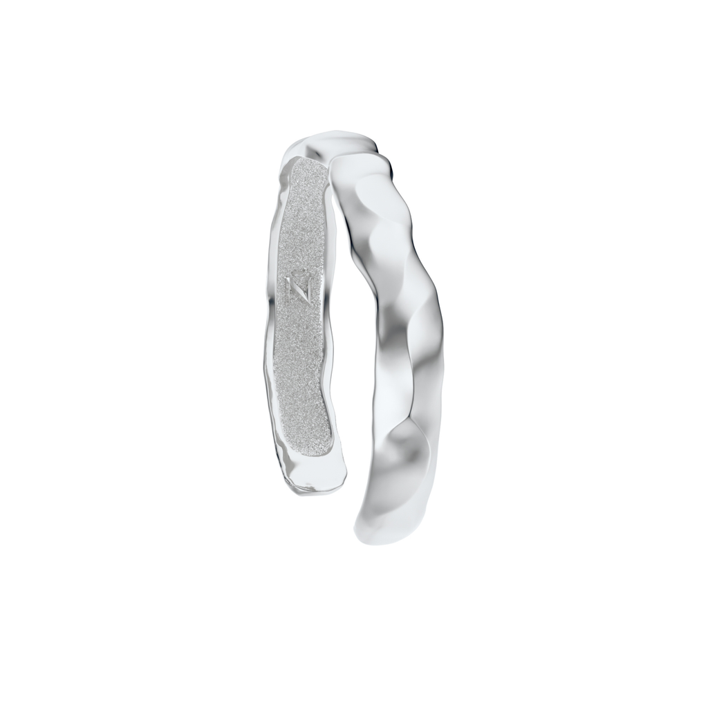 Ourea cuff - silver bracelet with a textured sculptural surface inspired by mountains and volcanic landscapes.  